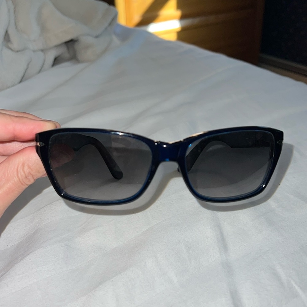 Hands made in Italy by Persol. Sky blue color. Dress up or down.